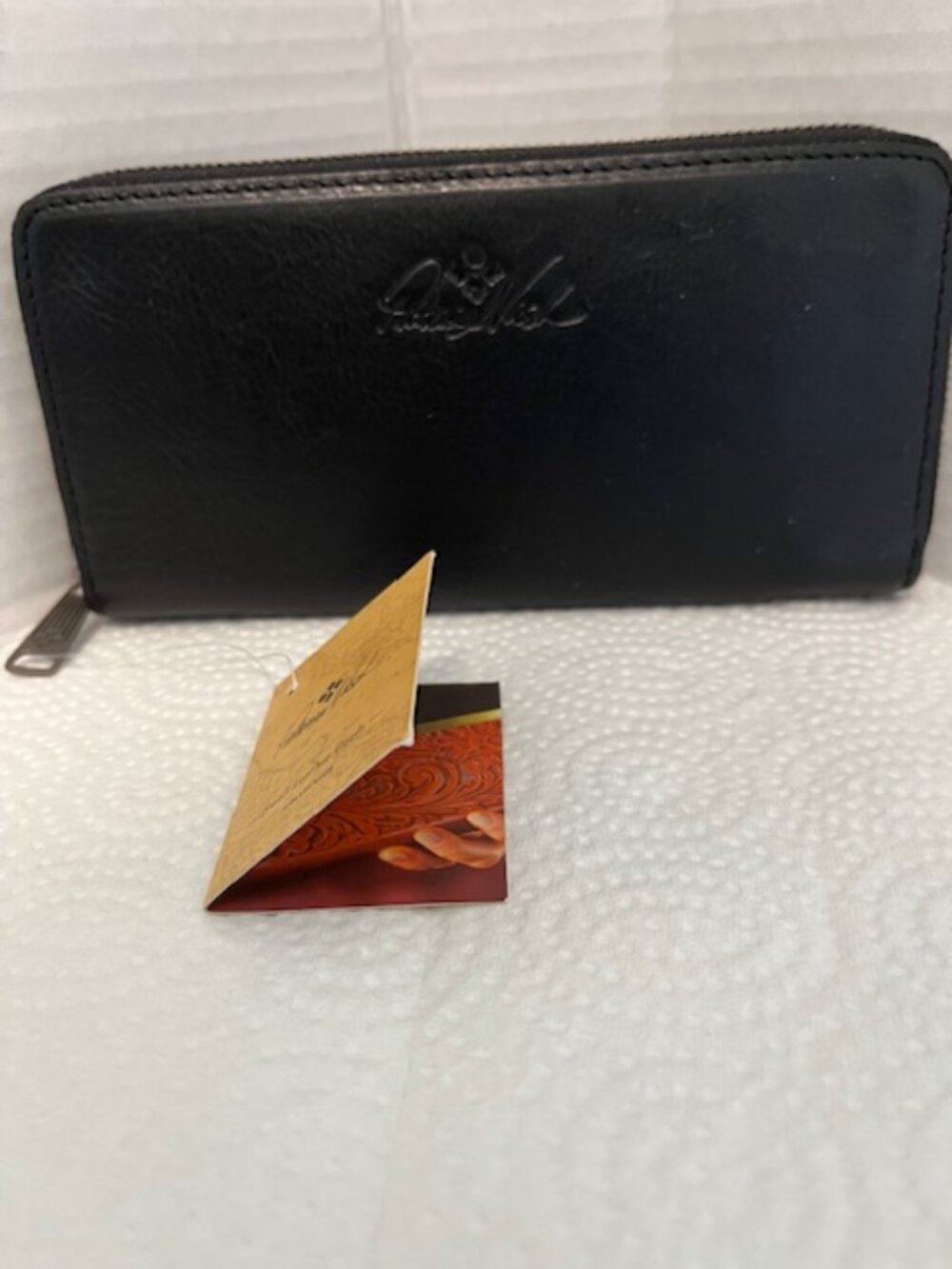 Patricia Nash black leather wallet.